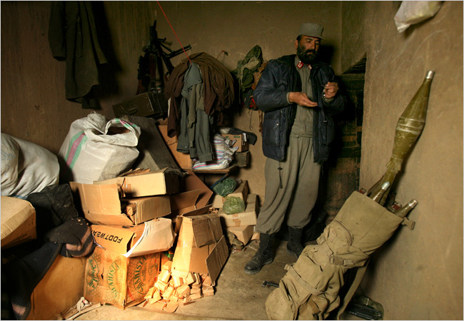 Lt. Col. Amanuddin surveyed 42-year-old Chinese ammunition from AEY that arrived in crumbling boxes at his Afghan police post. (Tyler Hicks/New York Times)